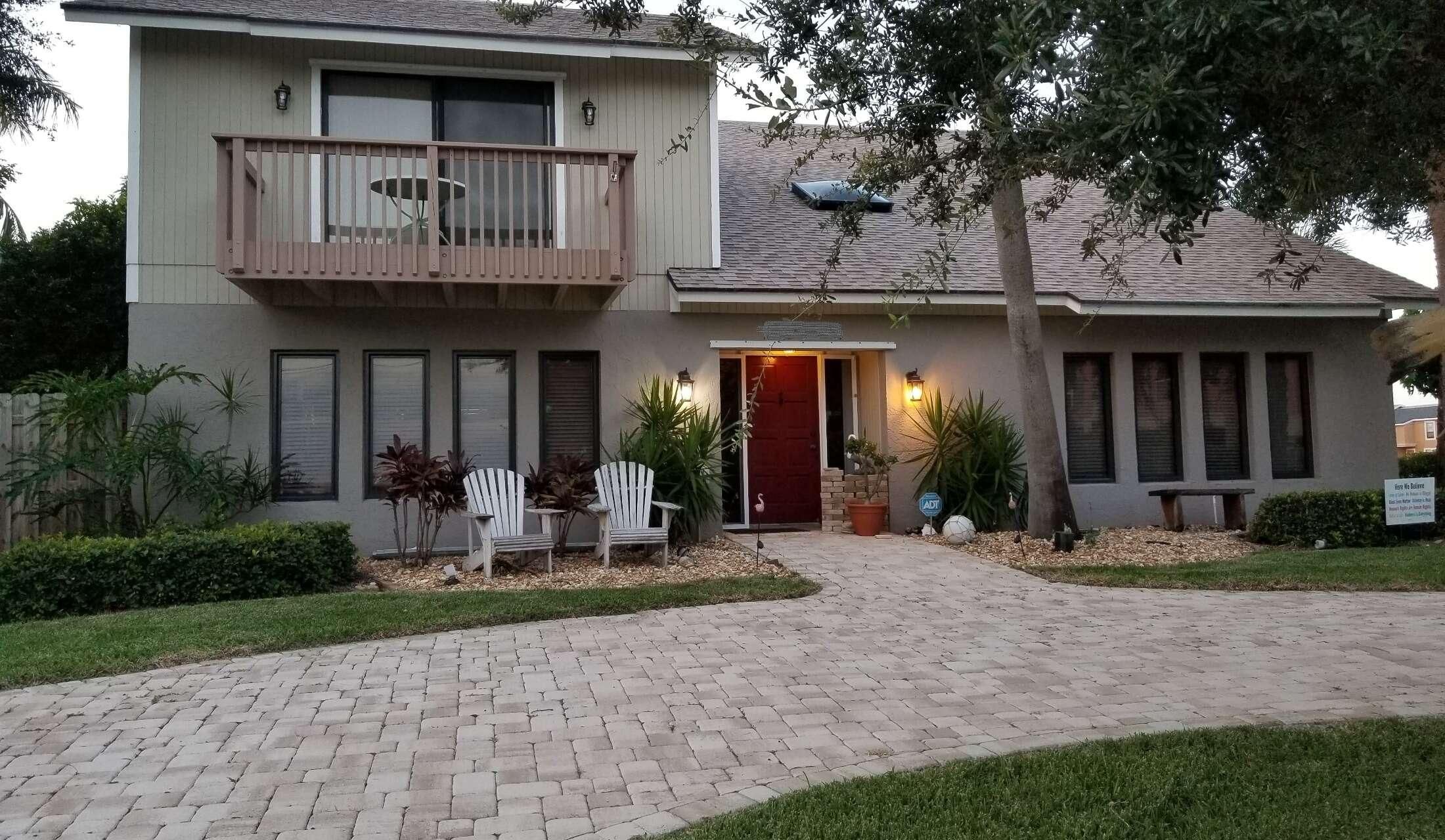 Great home, quiet neighborhood, close to the  beach and 3 loveable furry friends waiting to meet you - Image 3