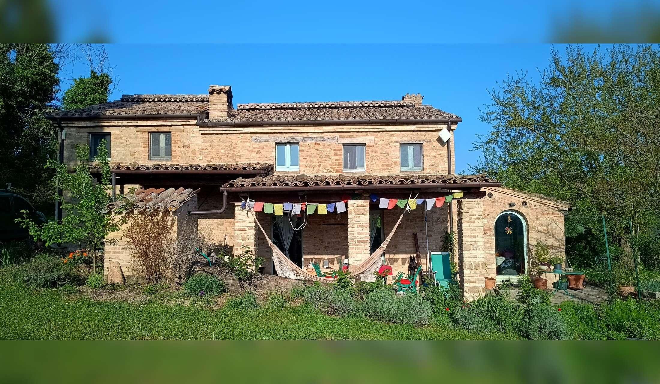 Classic stone house in the beautiful rolling hills of central Italy